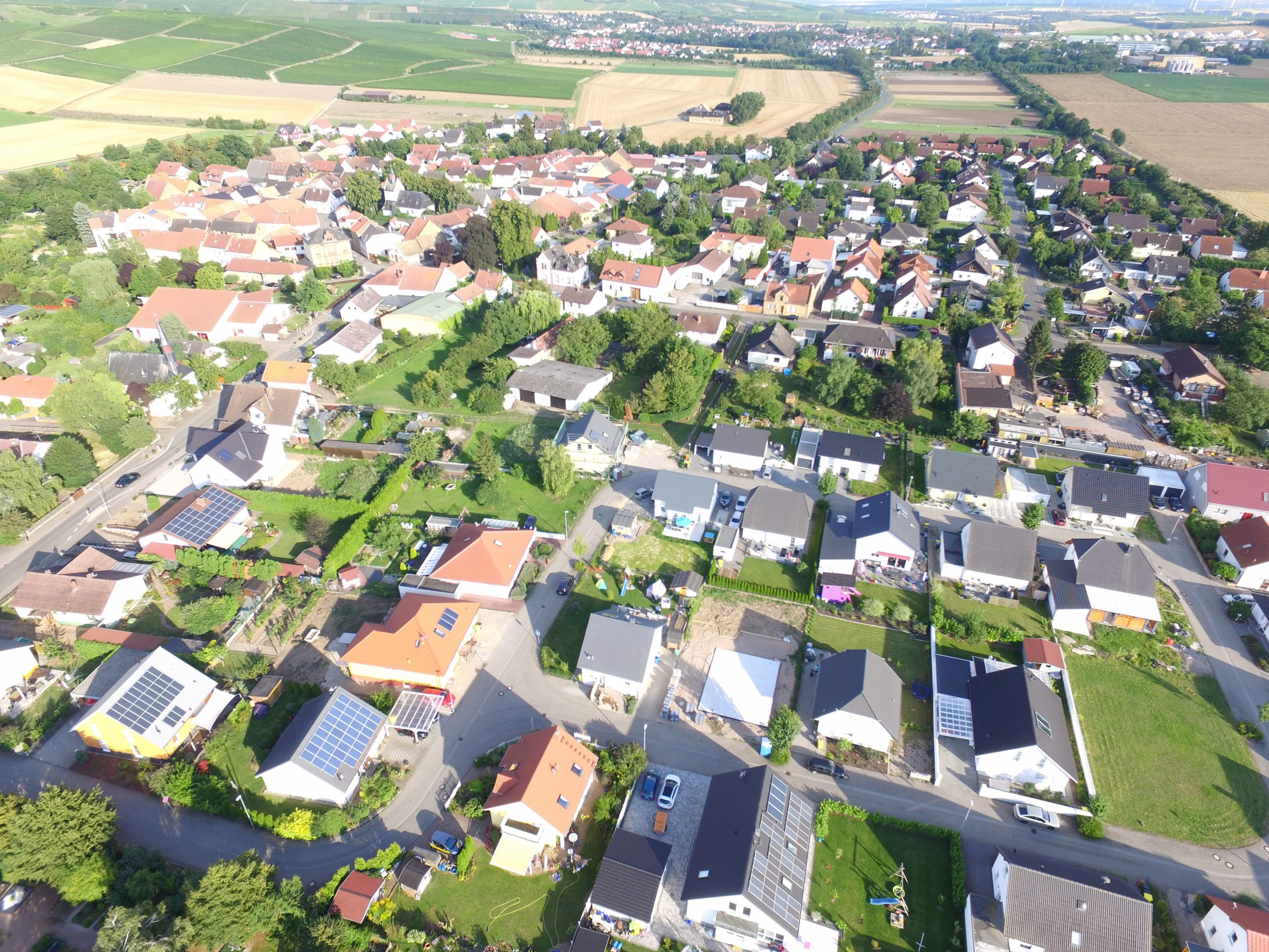 Aerial view of neighborhood during warmer months