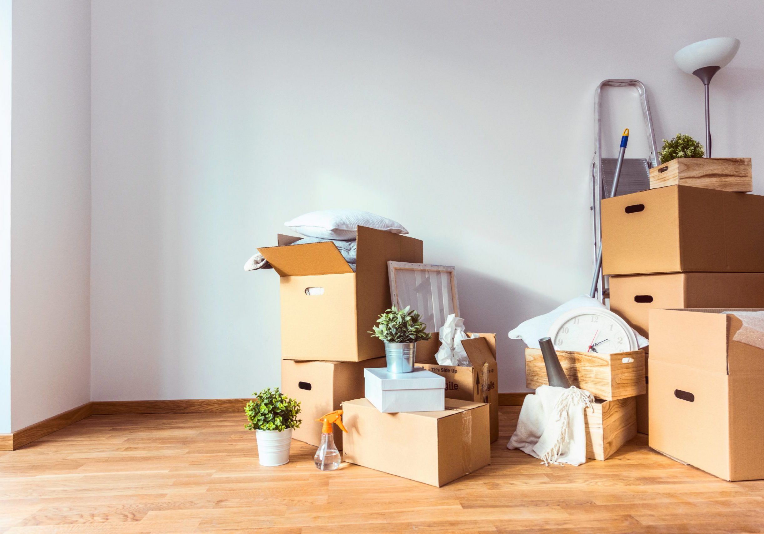 Boxes and items piled around each other to show that a move is about to happen