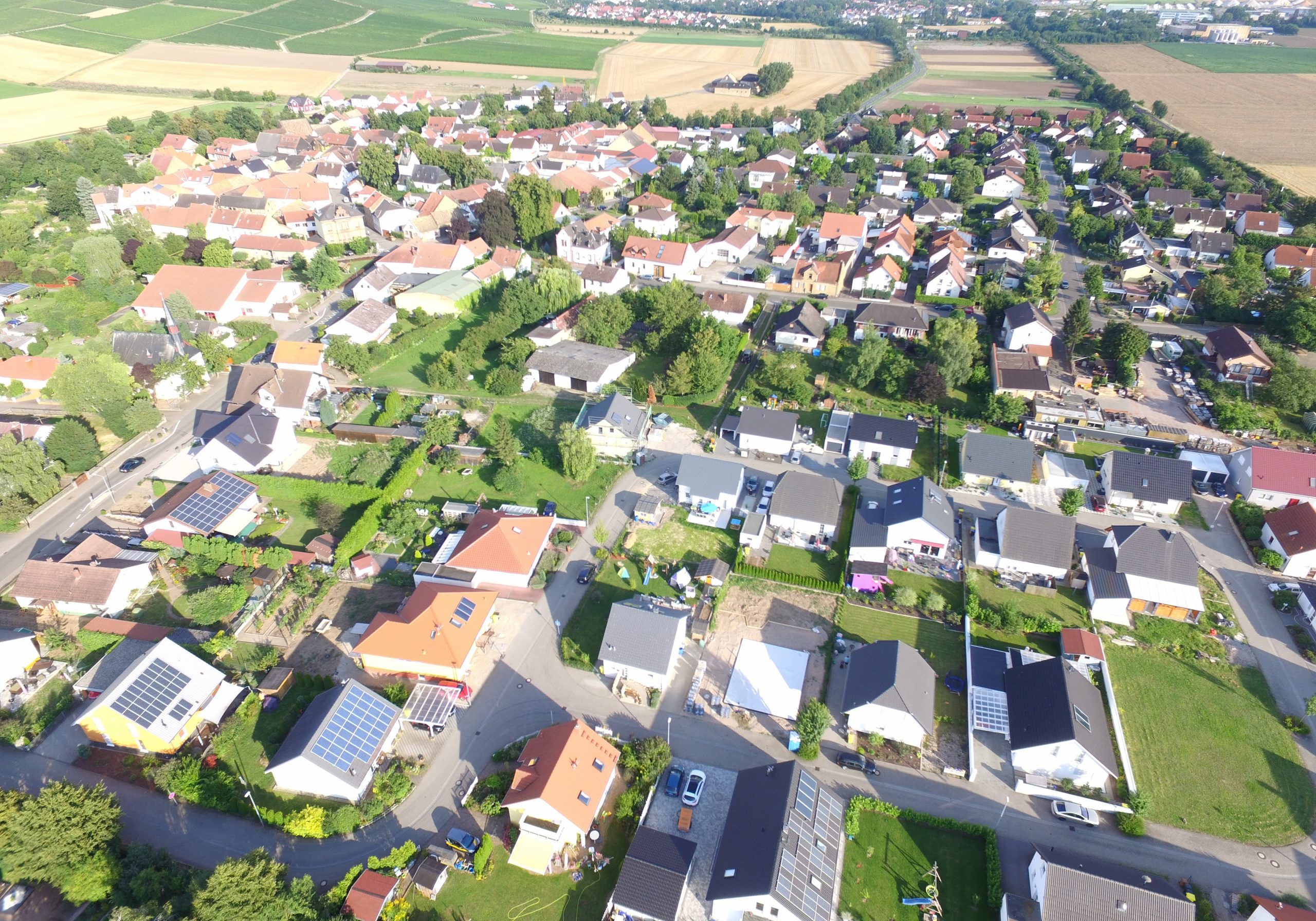 Aerial view of neighborhood during warmer months